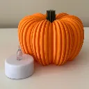 Geribbelde-pompoen-met-led-oranje.webp